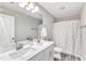 Clean bathroom with double vanity and a shower/tub at 148 Aylebury Rdg, Zebulon, NC 27597