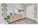 Bright entryway with a console table and decorative wall art at 148 Aylebury Rdg, Zebulon, NC 27597