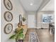 Bright entryway with a console table and decorative wall art at 148 Aylebury Rdg, Zebulon, NC 27597