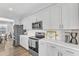 Kitchen with stainless steel appliances and white cabinets at 148 Aylebury Rdg, Zebulon, NC 27597