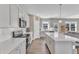 Modern kitchen with white cabinets and center island at 148 Aylebury Rdg, Zebulon, NC 27597