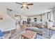 Open concept living and kitchen with island, stainless steel appliances, and hardwood floors at 148 Aylebury Rdg, Zebulon, NC 27597