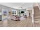 Living area features hardwood floors, and a ceiling fan at 148 Aylebury Rdg, Zebulon, NC 27597