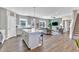 Spacious living room with hardwood floors and a view of the kitchen at 148 Aylebury Rdg, Zebulon, NC 27597