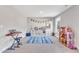 Bright playroom with built-in storage, toys, and a keyboard at 148 Aylebury Rdg, Zebulon, NC 27597