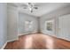 Spacious bedroom with hardwood floors and large windows at 1501 S Roxboro St, Durham, NC 27701