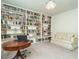 Bright office with built-in bookshelves at 1908 Cypress Cove Dr, Wendell, NC 27591