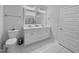 Elegant bathroom boasts a double vanity and a large mirror at 1927 Channel St, Graham, NC 27253