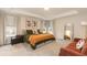 Spacious bedroom with large windows and a sitting area at 2371 Kettle Falls Sta, Apex, NC 27502