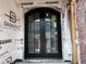 Elegant black double front doors with glass panels and decorative trim details at 274 Westhampton Dr, Pittsboro, NC 27312
