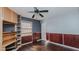 Bedroom with built-in shelves and hardwood floor at 3042 Marlborough Rd, Burlington, NC 27215