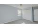 Bedroom with closet and window, light walls at 3042 Marlborough Rd, Burlington, NC 27215