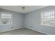 Bedroom with two windows and ceiling fan at 3042 Marlborough Rd, Burlington, NC 27215