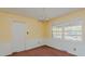 Dining room features carpet and large windows at 3042 Marlborough Rd, Burlington, NC 27215