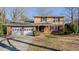 Brick ranch house with attached two-car garage and a well-manicured lawn at 3042 Marlborough Rd, Burlington, NC 27215