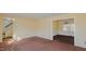 Living room with carpet and view to dining area at 3042 Marlborough Rd, Burlington, NC 27215