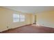 Living room with carpet and view to entryway at 3042 Marlborough Rd, Burlington, NC 27215