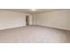 Large bedroom with window, neutral walls, and plush carpeting at 33 Sunburst Ct, Fuquay Varina, NC 27526