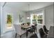 Dining area with a large window and access to the backyard at 33 Sunburst Ct, Fuquay Varina, NC 27526