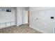 Laundry room with built-in shelving and cabinets at 33 Sunburst Ct, Fuquay Varina, NC 27526