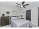 Charming bedroom with dresser and striped bedding at 36 Mountain View Dr, Garner, NC 27529