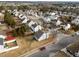 Aerial view of a residential neighborhood showing homes and landscaping at 3838 Potecasi Dr, Raleigh, NC 27610