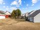Oversized backyard with patio, trees, and privacy at 3838 Potecasi Dr, Raleigh, NC 27610
