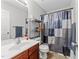 Bathroom with single vanity and shower/tub combo at 3838 Potecasi Dr, Raleigh, NC 27610