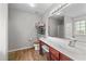 Bathroom with double vanity, soaking tub, and shower at 3838 Potecasi Dr, Raleigh, NC 27610