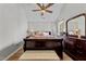 Bedroom with a queen-size bed and ceiling fan at 3838 Potecasi Dr, Raleigh, NC 27610