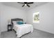 Comfortable bedroom featuring a plush bed, neutral decor, and a bright window view at 420 E Cedar Ave, Wake Forest, NC 27587