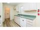 White appliances and green countertops in kitchen at 4304 Maggie Ct, Liberty, NC 27298