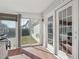 Sunroom with sliding glass doors and backyard access at 4314 Chimney Stone Rd, Durham, NC 27704