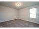Spacious bedroom with carpet and window at 45 River Chapel Dr, Fuquay Varina, NC 27526