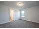 Bedroom with carpet and bathroom access at 45 River Chapel Dr, Fuquay Varina, NC 27526