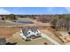 Aerial view showcases the new construction home, landscaping, and neighborhood setting at 4912 Hidden Pasture Way, Zebulon, NC 27597