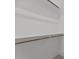Empty closet with wood rods at 4912 Hidden Pasture Way, Zebulon, NC 27597