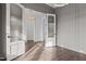 Elegant office space featuring coffered ceilings, gray walls and hardwood floors at 4912 Hidden Pasture Way, Zebulon, NC 27597