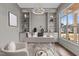 Home office featuring built-in shelving, a modern desk, and a large window at 4912 Hidden Pasture Way, Zebulon, NC 27597