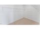 Large walk-in closet with wire shelving at 602 Market Grove Dr # 200, Wake Forest, NC 27587