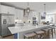 Gourmet kitchen with a large island and stainless steel appliances at 602 Market Grove Dr # 200, Wake Forest, NC 27587