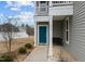 House exterior showcasing teal front door and walkway at 655 Hawksbill Dr, Franklinton, NC 27525