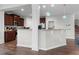 Kitchen with dark brown cabinets and a breakfast bar at 655 Hawksbill Dr, Franklinton, NC 27525