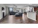 Spacious living room with fireplace, sectional sofa, and hardwood floors at 655 Hawksbill Dr, Franklinton, NC 27525
