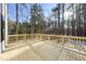 Deck overlooking wooded backyard with privacy at 7218 Sunrise Rd, Chapel Hill, NC 27514