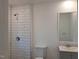 Bathroom with shower, toilet and gray vanity at 723 S Washington St, Rocky Mount, NC 27801