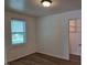 Bright bedroom with wood flooring and a closet at 723 S Washington St, Rocky Mount, NC 27801