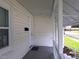 Front porch with white railings and gray floor at 723 S Washington St, Rocky Mount, NC 27801