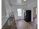 Kitchen with granite counters and white cabinets at 723 S Washington St, Rocky Mount, NC 27801