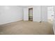 Bright bedroom with carpet and a large closet at 927 Bellvue St, Burlington, NC 27217